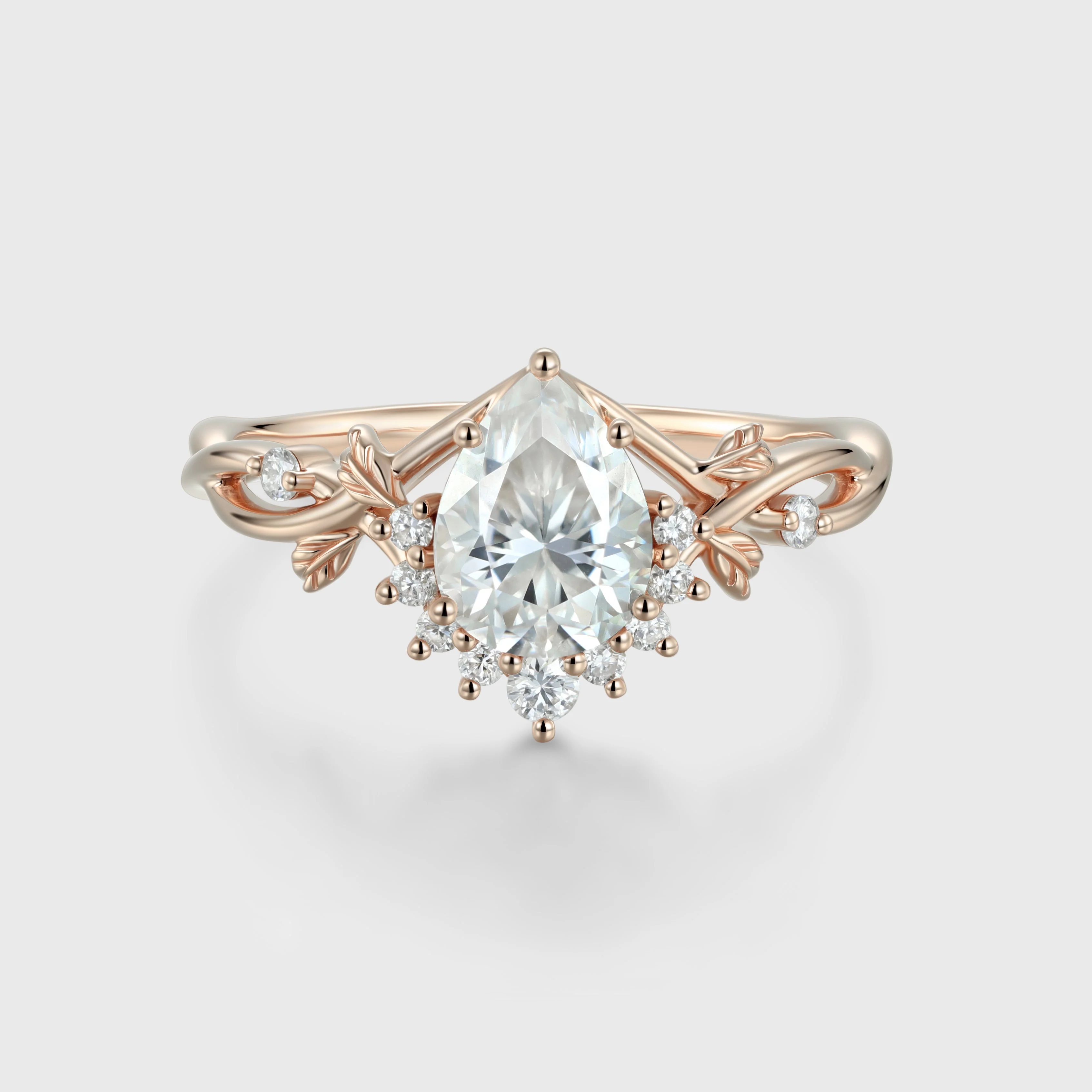Nature Inspired Pear cut Moissanite Leaf Gold Engagement Ring